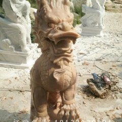 踩球麒麟雕塑，晚霞紅麒麟石雕