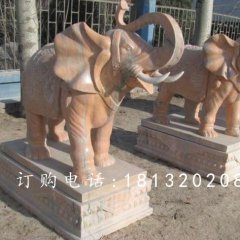 象鼻向上大象石雕，晚霞紅大象雕塑