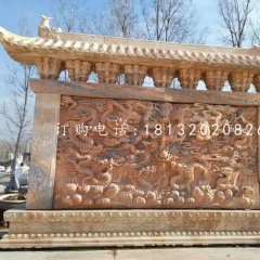九龍影壁雕塑，晚霞紅石雕影壁
