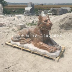 趴著的老虎石雕，晚霞紅動(dòng)物雕塑